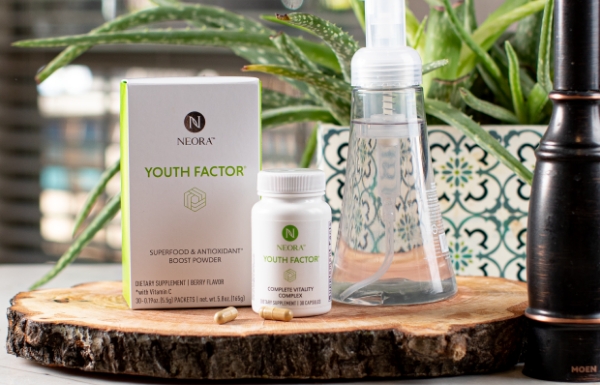 LIfestyle shot of Youth Factor® Combo Pack sitting on a wooden board.
